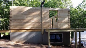 logs pre-cut for door, under construction, laminated, kiln dried, Timberhaven, custom built log home, home builder