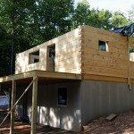 log home under construction, Timberhaven, custom built log home, kiln dried, home builder, Timberhaven, laminated