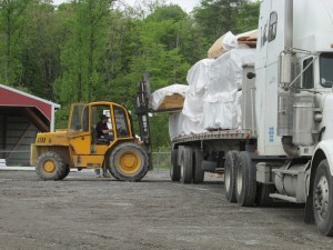 forklist loading truck for delivery, Timberhaven, delivery day, log homes, log cabin, custom built log home, laminated, kiln-dried