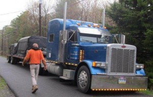 tarped tractor trailer truck, Timberhaven, delivery day, log homes, log cabin, custom built log home, laminated, kiln-dried