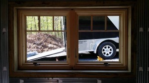 basement window, superior walls, Timberhaven Log Homes, custom built log home, kiln dried