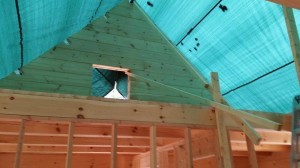 gable end constructed, peak of gable, log home construction, Timberhaven, custom built log homes, kiln dried, laminated