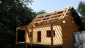 log cabin exposed roof, log home under construction, custom built log home, Timberhaven, kiln dried, laminated