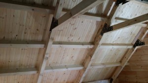 beam & pulin roof system, log home under construction, custom built log home, Timberhaven, kiln dried, laminated, heavy timbered system