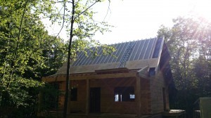 roof construction, furring strips in place, custom built log home, log home under construction, Timberhaven Log Homes, laminated, kiln dried, weather-tight