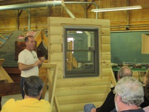 window installation demonstration, log home construction workshop, Timberhaven, laminated, weather-tight phase, log home under construction, custom built, kiln-dried, laminated