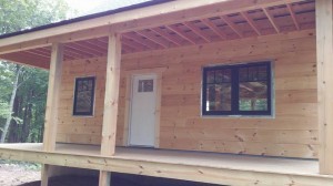 window and door installation, Timberhaven, log homes, log home under construction, custom built log home, laminated, kiln-dried, White Pine