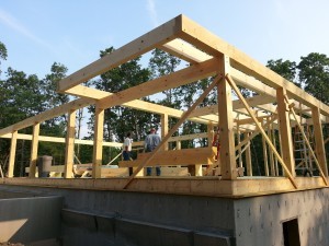 cantilever over first floor, balcony over first floor, post and beam construction, under construction, log homes, log cabins, log cabin kits, Timberhaven, post and beam cabin, post and beam cabin kits, kiln dried, laminated