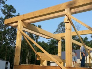 post and beams braced with 2x4s on first level of home, post and beam construction, under construction, log homes, log cabins, log cabin kits, Timberhaven, post and beam cabin, post and beam cabin kits, kiln dried, laminated