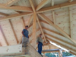 builders in awe of beautiful roof on post and beam home, heavy timbers, tongue and groove finish, under construction, Timberhaven Log Homes, log cabins, log cabin kits, log kits, laminated, kiln dried