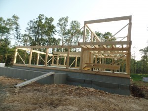 second floor framework on post and beam home, post and beam homes, under construction, Timberhaven Log Homes, log home, log cabin, log cabins, laminated, kiln dried