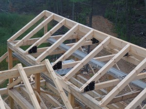 heavy timber roof system with gusset plates, post and beam home design, under construction, log homes, log cabins, log kits, Timberhaven, laminated, kiln dried