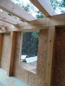 interior shot of SIP panels in place, first floor SIPs installed to custom post and beam home, post and beam homes, under construction, log homes, log cabin, log cabin kits, Timberhaven Log Homes, laminated, kiln dried, heavy timbers, SIPs