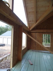 interior shot of first floor SIPs installed to custom post and beam home, post and beam homes, under construction, log homes, log cabin, log cabin kits, Timberhaven Log Homes, laminated, kiln dried, heavy timbers, SIPs