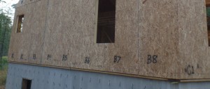 alph-numeric labeling on SIPs, custom post and beam home, post and beam homes, under construction, log homes, log cabin, log cabin kits, Timberhaven Log Homes, laminated, kiln dried, heavy timbers, SIPs