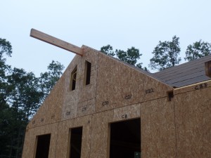 two-story post and beam home, glu-lam over front porch area, custom post and beam home construction, post and beam homes, post and beam home design, Timberhaven Log Homes, log homes, log home, log cabins, log cabin kits, laminated, kiln dried, under construction