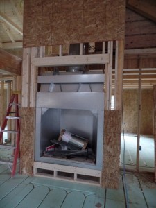 insert into custom fireplace, custom wood home, Timberhaven log homes, log cabin kit, log cabins, kiln dried, laminated, no shop package, fireplace