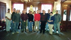 staff at Timberhaven Log Homes in front of Christmas tree, log homes, log cabins, log cabin kits, laminated, kiln dried, custom designed, Timberhaven, best log homes