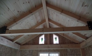 cozy master bedroom with cathedral ceiling, two-story home, post and beam house, laminated logs, heavy timbers, Timberhaven, log homes, log cabin kits, kiln dried