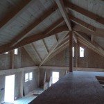 dramatic post and beam ceiling from loft, two-story home, post and beam house, laminated logs, heavy timbers, Timberhaven, log homes, log cabin kits, kiln dried