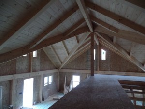 dramatic post and beam ceiling from loft, two-story home, post and beam house, laminated logs, heavy timbers, Timberhaven, log homes, log cabin kits, kiln dried