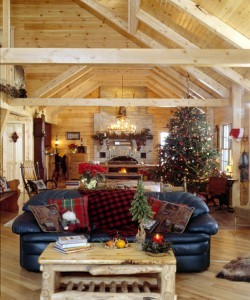 great room in holiday themed log home, timberhaven log homes, log homes, log cabin kits, log cabins, Merry Christmas, stone fireplace