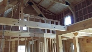 unfinished inside of log cabin home with loft, log cabin, log cabin homes, log homes, log cabin kits, Timberhaven, under construction, post and beam, laminated, kiln dried, PA manufacturer