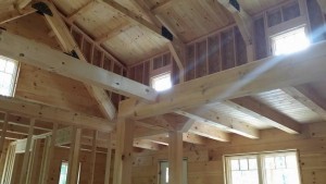 wide open living area and second floor loft, log cabin, log homes, log cabin homes, Timberhaven, under construction, laminated, kiln dried, Pennsylvania manufacturer