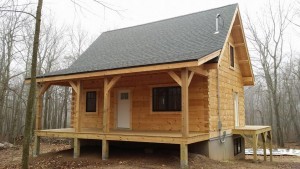 weather tight log cabin, log cabin, log cabin homes, log homes, log cabin kits, Timberhaven, under construction, post and beam, laminated, kiln dried, PA manufacturer