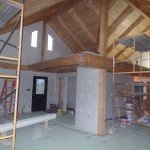 wide open living area and loft, post and beam, custom home, log homes, log cabins, log cabin kits, Timberhaven, laminated, kiln dried, under construction, PA log home manufacture