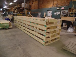 specialized pallets for log home going to Ireland, Timberhaven Log Homes, log homes, log cabin homes, log cabins, post and beam homes, timberframe homes, timber frame homes, laminated logs, engineered logs, floor plan designs, kiln dried logs, , international distribution