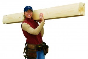 girl holding light-weight kiln dried log, Timberhaven Log Homes, log homes, log cabins, log cabin homes, laminated logs, kiln dried logs, engineered logs, kiln-dried laminated logs, post and beam home, timber frame, Pennsylvania