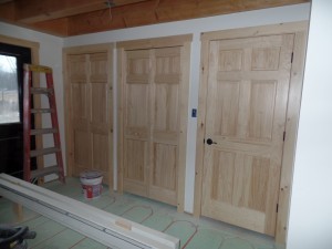 White Pine solid, raised-panel interior doors, post and beam home, interior finishes, Timberhaven Log Homes, log homes, log cabin homes, log cabins, post and beam homes, timberframe homes, timber frame homes, laminated logs, engineered logs, floor plan designs, kiln dried logs