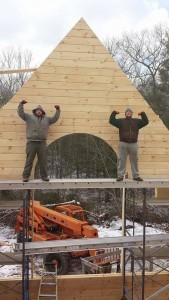 builders stacking gable end logs, two story log home construction, solid log gables, Timberhaven Log Homes, log homes, log cabin homes, log cabins, post and beam homes, timberframe homes, timber frame homes, laminated logs, engineered logs, floor plan designs, kiln dried logs, Flury Builders, Joe Walsh, Timberhaven local reps, log homes in Massachusetts, log homes in Rhode Island, MA, RI, log home builders