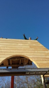 builders stacking gable end logs, two story log home construction, solid log gables, Timberhaven Log Homes, log homes, log cabin homes, log cabins, post and beam homes, timberframe homes, timber frame homes, laminated logs, engineered logs, floor plan designs, kiln dried logs, Flury Builders, Joe Walsh, Timberhaven local reps, log homes in Massachusetts, log homes in Rhode Island, MA, RI, log home builders