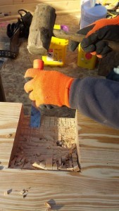 craftsman notching out beam pocket for loft joist, Rhode Island log home, Timberhaven Log Homes, log homes, log cabin homes, log cabins, post and beam homes, timberframe homes, timber frame homes, laminated logs, engineered logs, floor plan designs, kiln dried logs, Flury Builders, Joe Walsh, Timberhaven local reps, log homes in Massachusetts, log homes in Rhode Island, MA, RI, log home builders