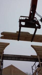 builders stacking gable end logs, two story log home construction, solid log gables, Timberhaven Log Homes, log homes, log cabin homes, log cabins, post and beam homes, timberframe homes, timber frame homes, laminated logs, engineered logs, floor plan designs, kiln dried logs, Flury Builders, Joe Walsh, Timberhaven local reps, log homes in Massachusetts, log homes in Rhode Island, MA, RI, log home builders