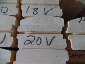 laminated logs with alpha-numeric coding on them, Rhode Island log home, Timberhaven Log Homes, log homes, log cabin homes, log cabins, post and beam homes, timberframe homes, timber frame homes, laminated logs, engineered logs, floor plan designs, kiln dried logs, Flury Builders, Joe Walsh, Timberhaven local reps, log homes in Massachusetts, log homes in Rhode Island, MA, RI, log home builders