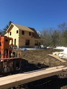 log home under construction, outdoor living areas being built, Timberhaven Log Homes, log homes, log cabin homes, log cabins, post and beam homes, timberframe homes, timber frame homes, laminated logs, engineered logs, floor plan designs, kiln dried logs, Flury Builders, Joe Walsh, Timberhaven local reps, log homes in Massachusetts, log homes in Rhode Island, MA, RI, log home builders