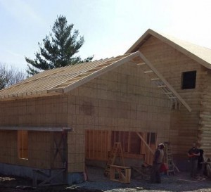 two-car garage with roof framing, Timberhaven Log Homes, log homes, log cabin homes, log cabins, post and beam homes, timberframe homes, timber frame homes, laminated logs, engineered logs, floor plan designs, kiln dried logs, Flury Builders, Joe Walsh, Timberhaven local reps, log homes in Massachusetts, log homes in Rhode Island, MA, RI, log home builders