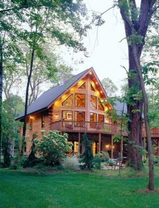 beautiful log home in wooden setting, Timberhaven Log Homes, log homes, log cabin homes, log cabins, post and beam homes, timberframe homes, timber frame homes, laminated logs, engineered logs, floor plan designs, kiln dried logs, Flury Builders, Joe Walsh, Timberhaven local reps, log homes in Massachusetts, log homes in Rhode Island, MA, RI, log home builders, comparing package quotes