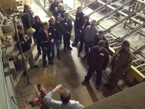 group reviewing lamination and testing demonstration at construction workshop photos of 2015, log home planning seminar, Log home kitchens, Timberhaven Log Homes, log homes, log cabin homes, log cabins, post and beam homes, timberframe homes, timber frame homes, laminated logs, engineered logs, floor plan designs, kiln dried logs, Timberhaven local reps, log homes in PA, log home builders