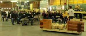 group sitting at construction workshop, log home planning seminar, Log home kitchens, Timberhaven Log Homes, log homes, log cabin homes, log cabins, post and beam homes, timberframe homes, timber frame homes, laminated logs, engineered logs, floor plan designs, kiln dried logs, Timberhaven local reps, log homes in PA, log home builders