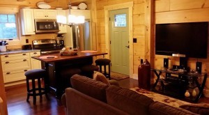 fully furnished main living area in log home, ultimate home, ultimate log home, Log home kitchens, Timberhaven Log Homes, log homes, log cabin homes, log cabins, post and beam homes, timberframe homes, timber frame homes, laminated logs, engineered logs, floor plan designs, kiln dried logs, Timberhaven local reps, log homes in PA, log home builders Area