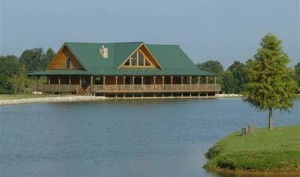 log home built on water, wraparound porch, green metal roof, ultimate home, ultimate log home, Log home kitchens, Timberhaven Log Homes, log homes, log cabin homes, log cabins, post and beam homes, timberframe homes, timber frame homes, laminated logs, engineered logs, floor plan designs, kiln dried logs, Timberhaven local reps, log homes in PA, log home builders