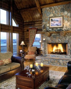 stone fireplace in log home great room, all roads lead home, Timberhaven Log Homes, log homes, log cabin homes, log cabins, post and beam homes, timberframe homes, timber frame homes, laminated logs, engineered logs, floor plan designs, kiln dried logs, Timberhaven local reps, log homes in PA, log home builders