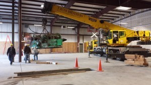 planer being lifted into place, new location, Timberhaven Log Homes, Timberhaven Log & Timber Homes, log homes, log cabin homes, log cabins, post and beam homes, timberframe homes, timber frame homes, laminated logs, engineered logs, floor plan designs, kiln dried logs, Timberhaven local reps, log homes in Pennsylvania, PA