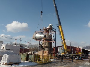 cyclone being moved by crane, We are moving, Timberhaven Log Homes, Timberhaven Log & Timber Homes, log homes, log cabin homes, log cabins, post and beam homes, timberframe homes, timber frame homes, laminated logs, engineered logs, floor plan designs, kiln dried logs, Timberhaven local reps, log homes in Pennsylvania, PA