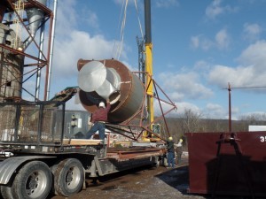 cyclone being loaded onto flatbed, We are moving, Timberhaven Log Homes, Timberhaven Log & Timber Homes, log homes, log cabin homes, log cabins, post and beam homes, timberframe homes, timber frame homes, laminated logs, engineered logs, floor plan designs, kiln dried logs, Timberhaven local reps, log homes in Pennsylvania, PA