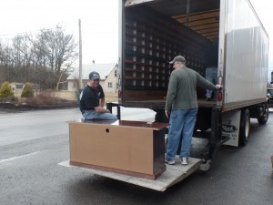 loading furniture into truck, office relocation, log homes, log cabin homes, log cabins, post and beam homes, timberframe homes, timber frame homes, laminated logs, engineered logs, floor plan designs, kiln dried logs, Timberhaven local reps, log homes in Pennsylvania, log homes in PA, Timberhaven Log Homes, Timberhaven Log & Timber Homes